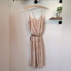 Paisley pattern lightweight 100% rayon fabric jumpsuit with adjustable straps.